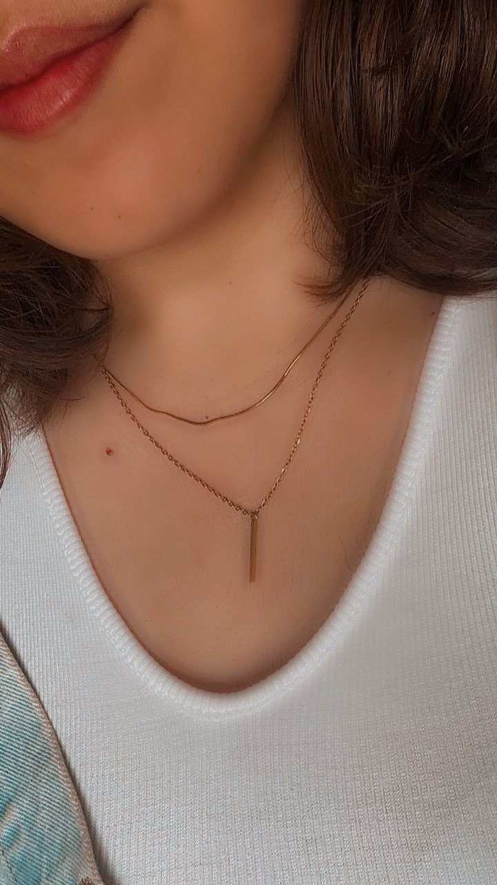 گردنبند دولاین استیل طلایی نماد میخ