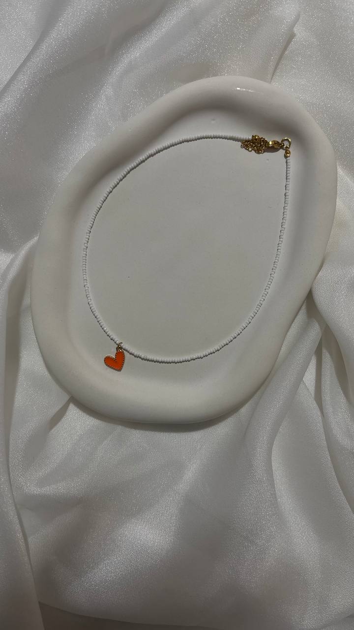 منجوق سفید قلب نارنجی